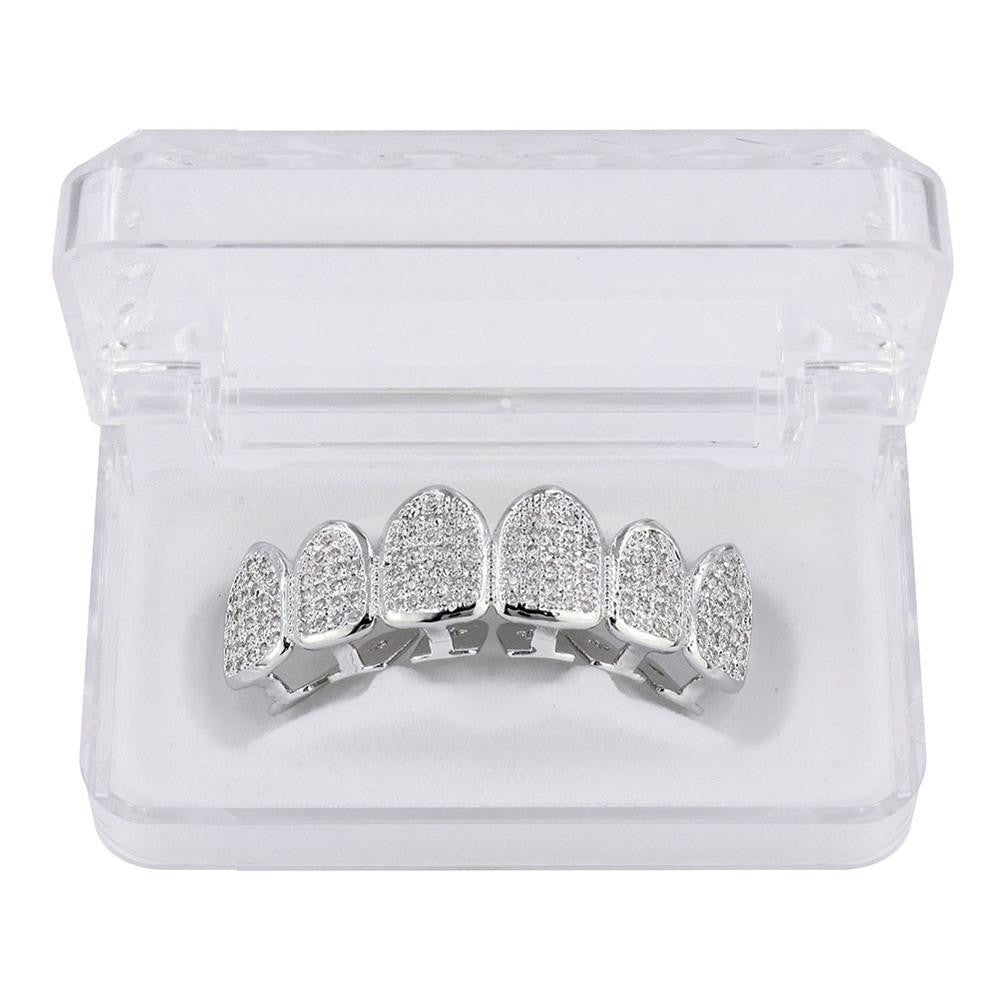 DatNewDrip silver six tooth iced out grillz with pave stones in clear display case