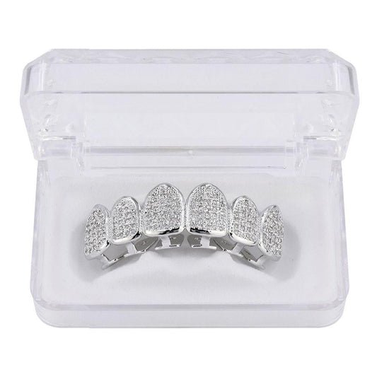DatNewDrip silver six tooth iced out grillz with pave stones in clear display case