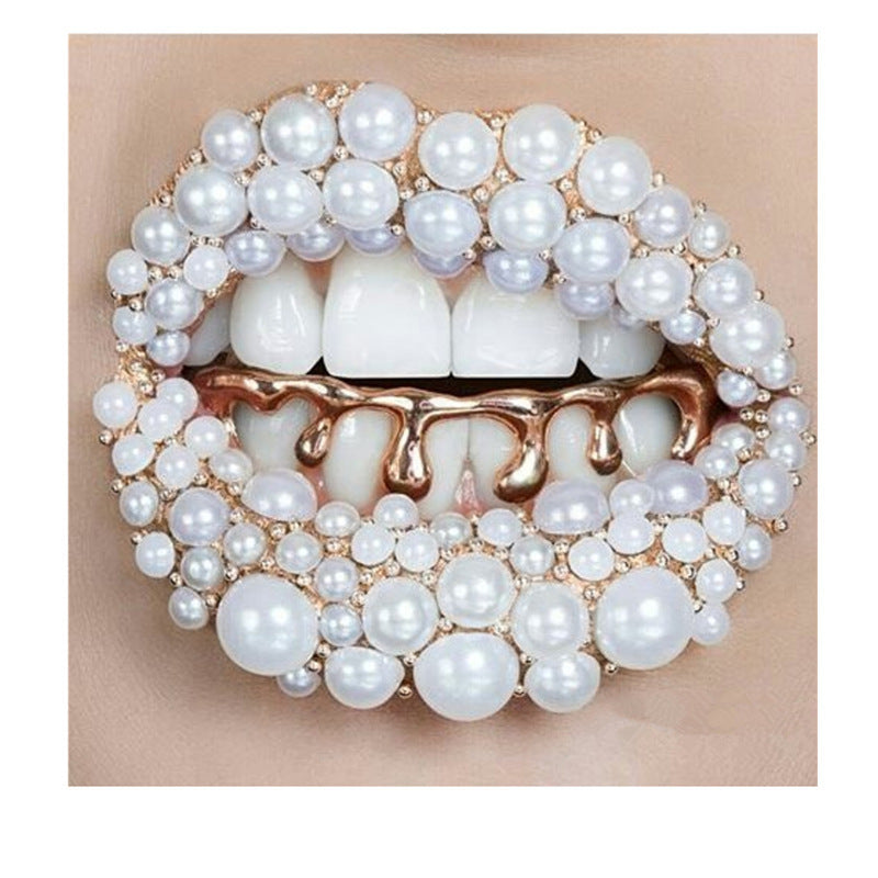 DatNewDrip gold hip hop grillz on teeth with rose gold drippy design surrounded by white pearl lip art
