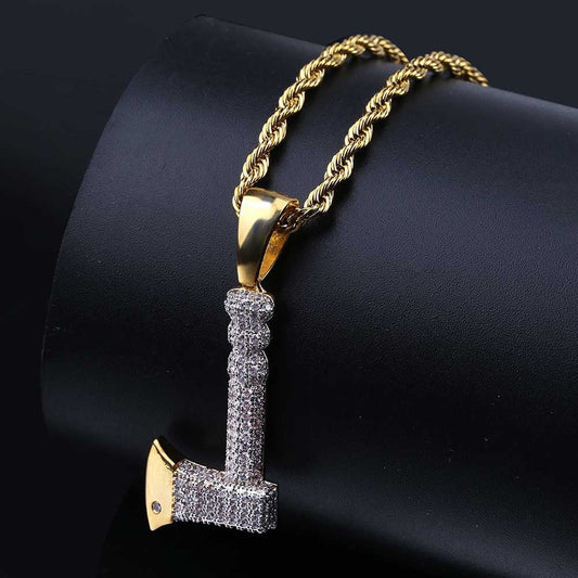 DatNewDrip iced out tomahawk pendant on gold rope chain with pave cubic zirconia and polished gold axe head