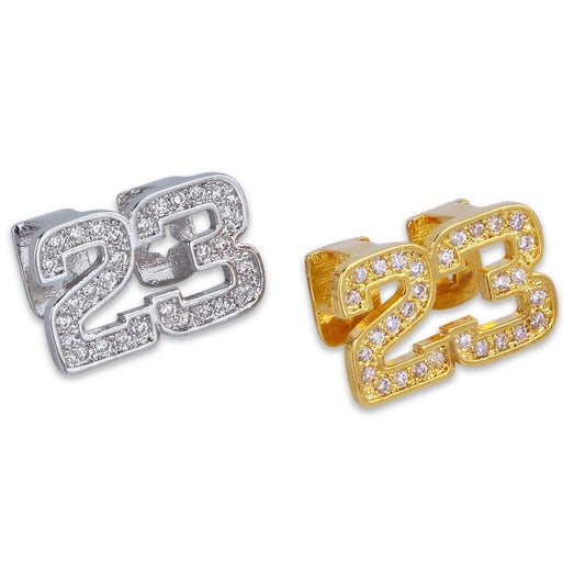 DatNewDrip 23 two tooth grillz set in silver and gold with clear cubic zirconia accents for two front teeth