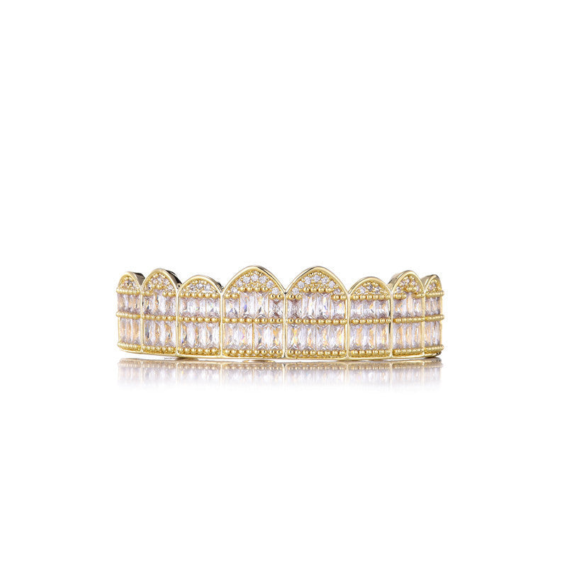 Gold hip hop style iced out baguette grillz set with sparkling baguette stones on white background