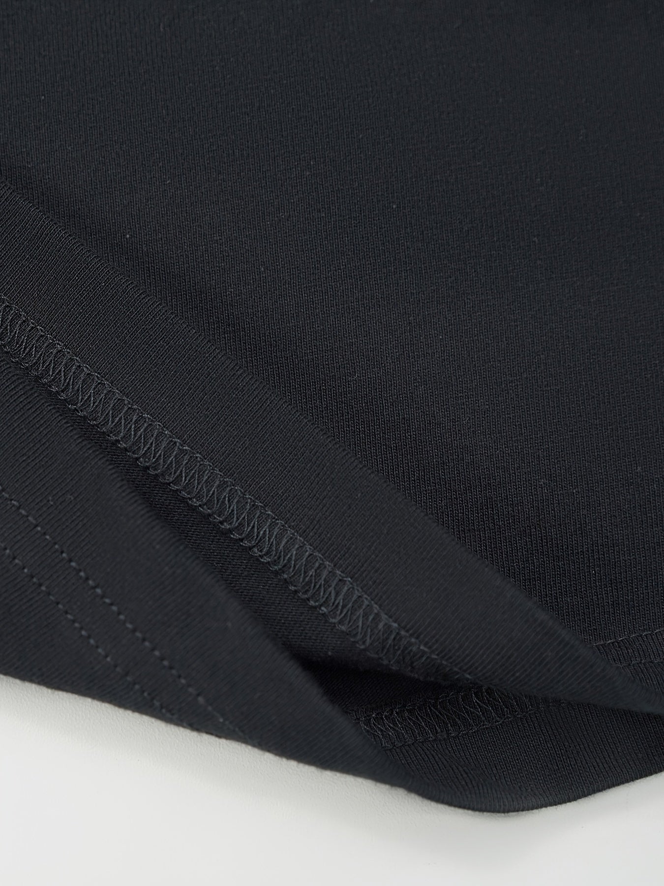 Close-up of black fabric showing stitching details for Bob Seger t-shirt mens