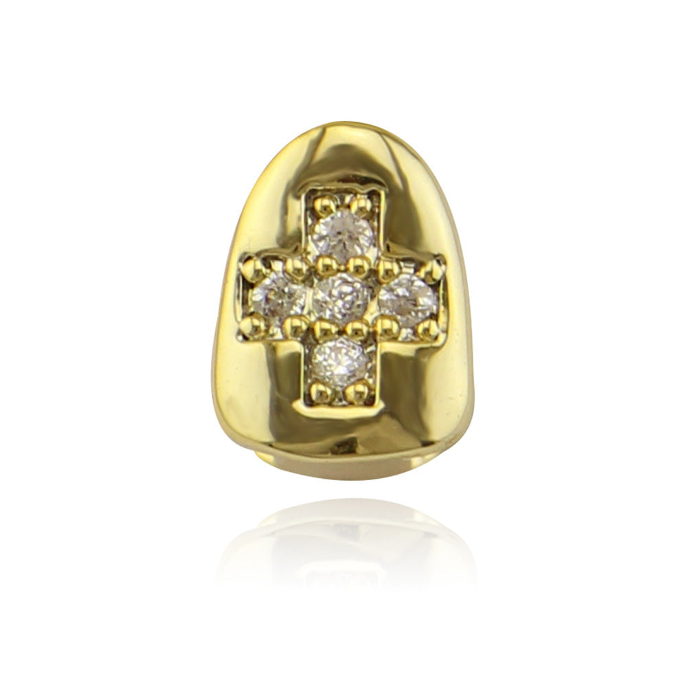 Gold tooth grill cap with cross set diamonds and polished finish diamond cross hip hop tooth grill