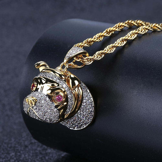 DatNewDrip gold rope chain showcasing iced out bulldog pendant with pink gem eyes and pave crystals
