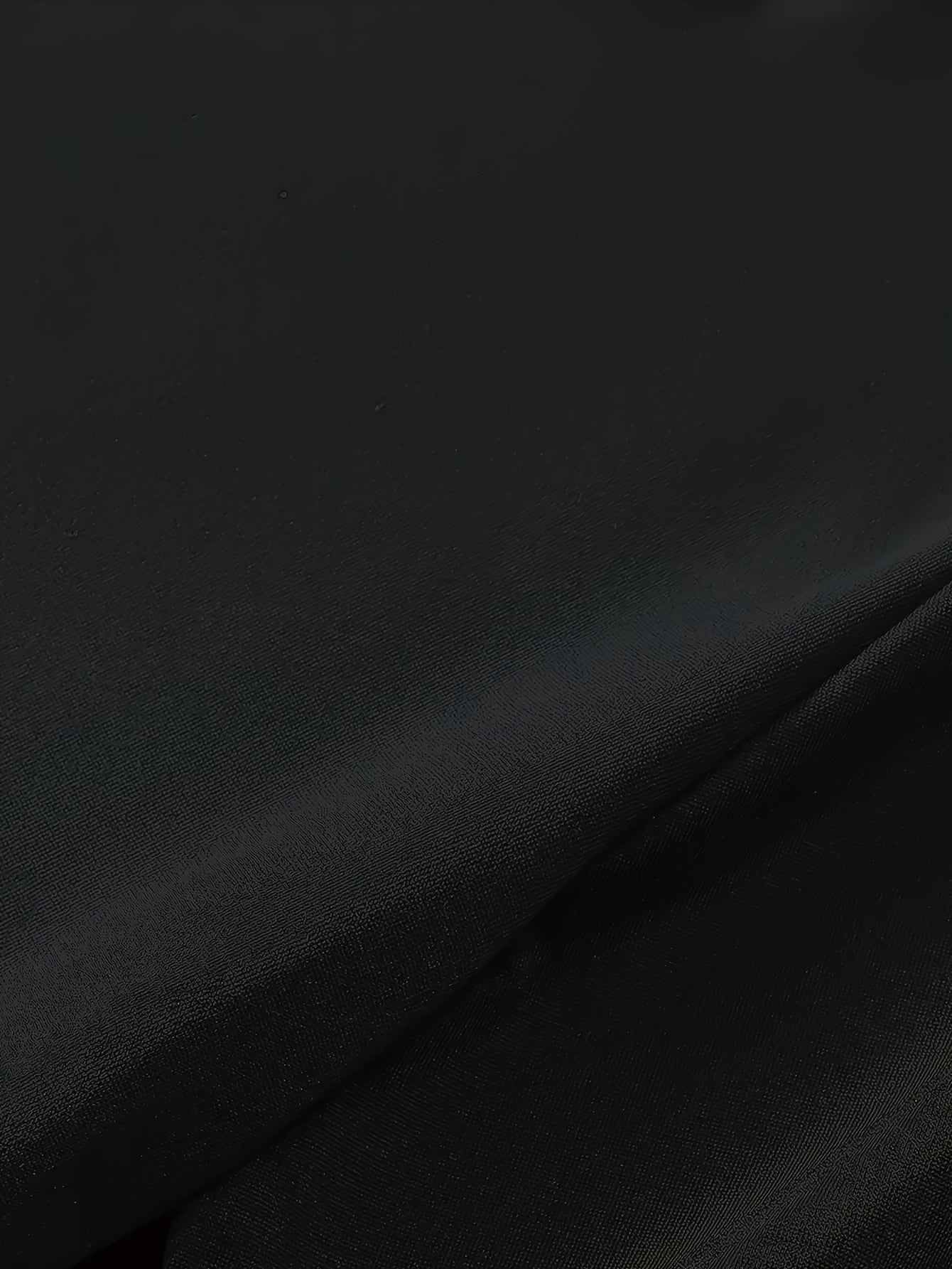 Black graphic streetwear t-shirt featuring a smooth fabric and modern design for casual outfits