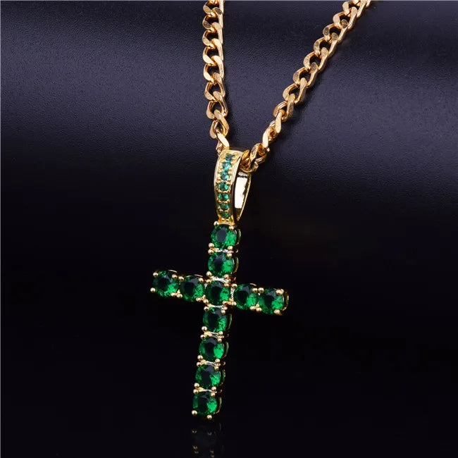 Gold hip hop cross necklace with green gemstones, perfect for stylish accessories