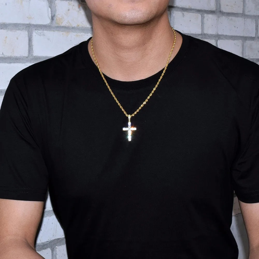 Stylish hip hop cross necklace with a shimmering pendant worn by a man in a black t-shirt