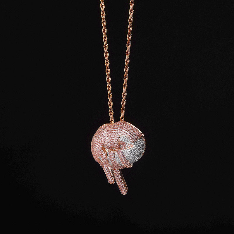 DatNewDrip iced out lips pendant in rose gold with white crystal pave and twisted rope chain