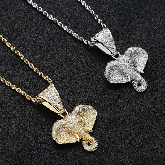 DatNewDrip iced out elephant pendant in gold and silver with sparkling stones on twisted chains
