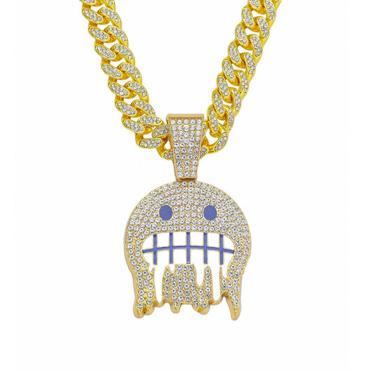 Iced out frosty face pendant on a gold chain with sparkling details and vibrant colors