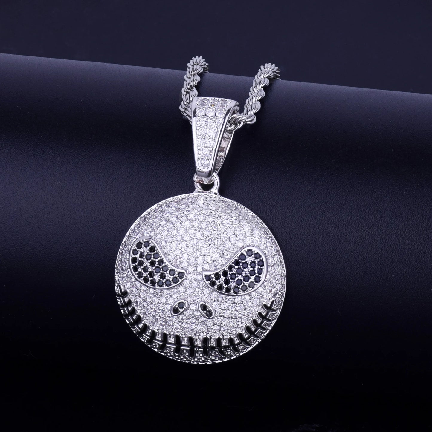 Iced out jack skeleton smiling pendant necklace with sparkling rhinestones and a bold design