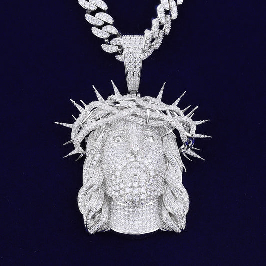 Iced out Jesus piece necklace featuring intricate diamond detailing and a gold chain for a bold look