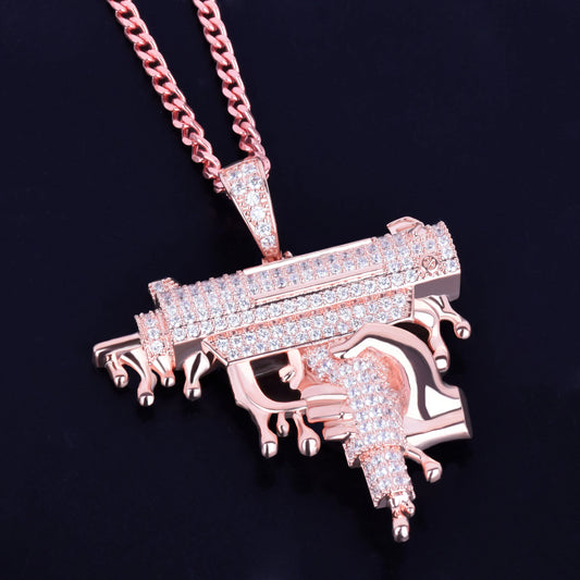 Iced Out Opps Uzi Pendant Necklace in rose gold with intricate diamond detailing
