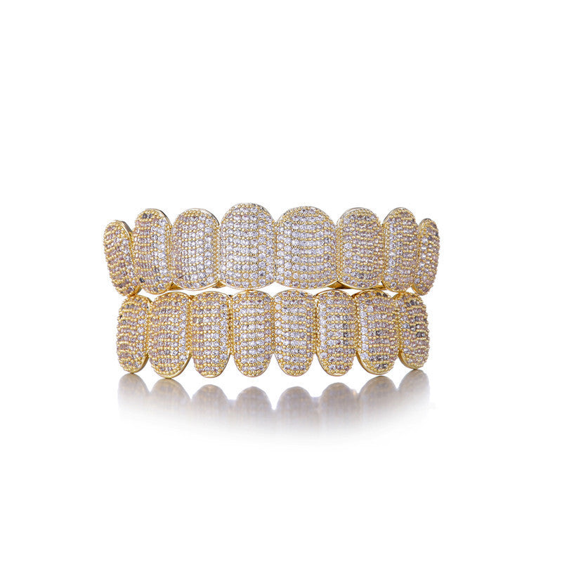 DatNewDrip gold full set iced out hip hop grillz with pave diamond stones covering top and bottom teeth reflection