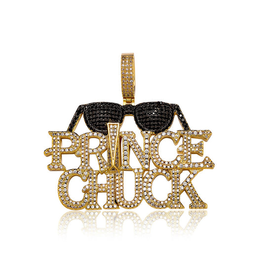 DatNewDrip iced out prince chuck pendant gold nameplate encrusted with clear stones and black sunglass stones