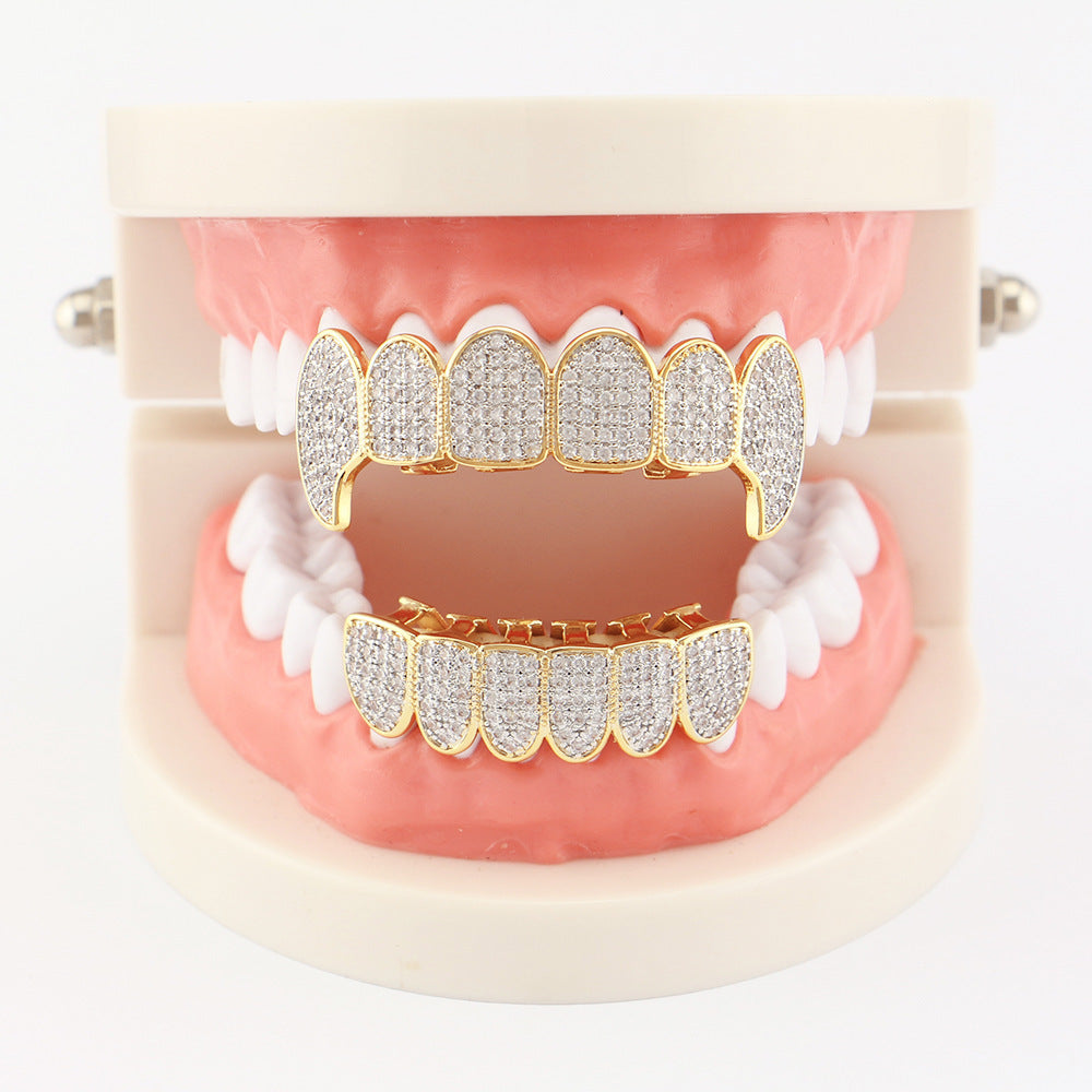 DatNewDrip iced out vampire fang grillz gold diamond pave upper and lower displayed on dental model