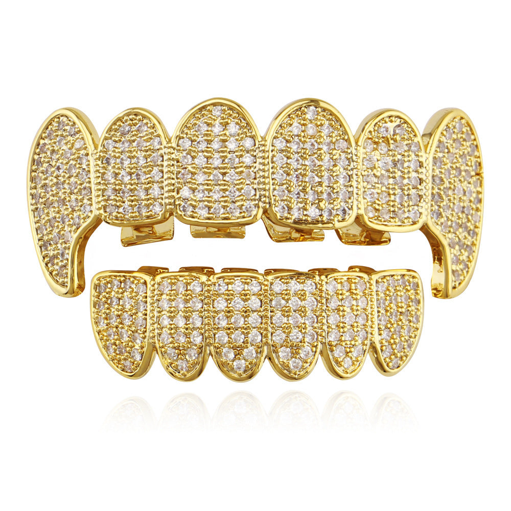 DatNewDrip gold iced out vampire fang grillz with full tooth coverage and crystal pave stones