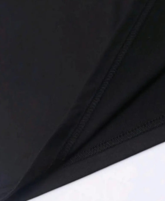 Close-up of the fabric detail on a DatNewDrip Walt Whiskey t-shirt mens for a comfortable fit