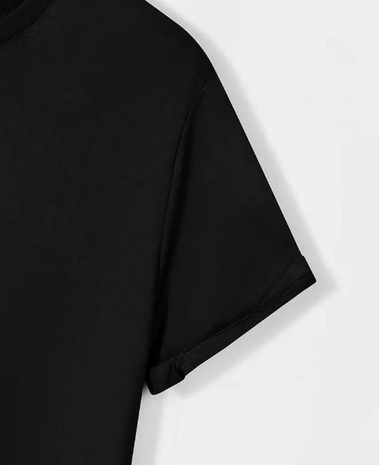 Close-up of the sleeve of a black planet parade t-shirt mens featuring a casual design