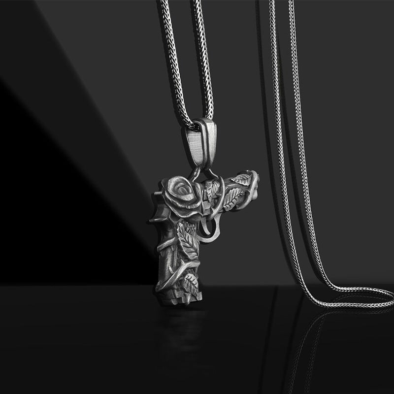 DatNewDrip men's gun and rose pendant necklace in silver stainless steel with detailed floral engraving