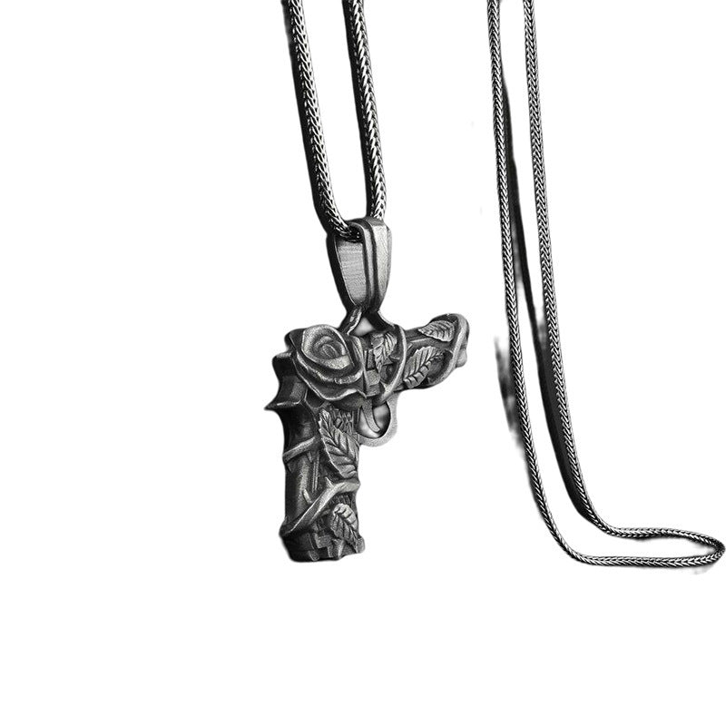 DatNewDrip stainless steel men's gun and rose pendant necklace with engraved floral details on snake chain