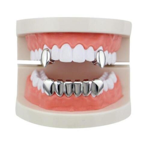 DatNewDrip silver vampire grillz for teeth set showing upper fang caps and lower full tooth grill