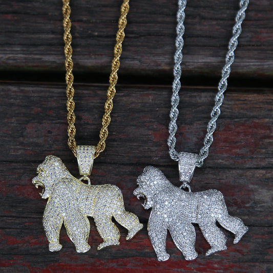 DatNewDrip iced out gorilla pendant set in gold and silver with rope chains and pave cubic zirconia
