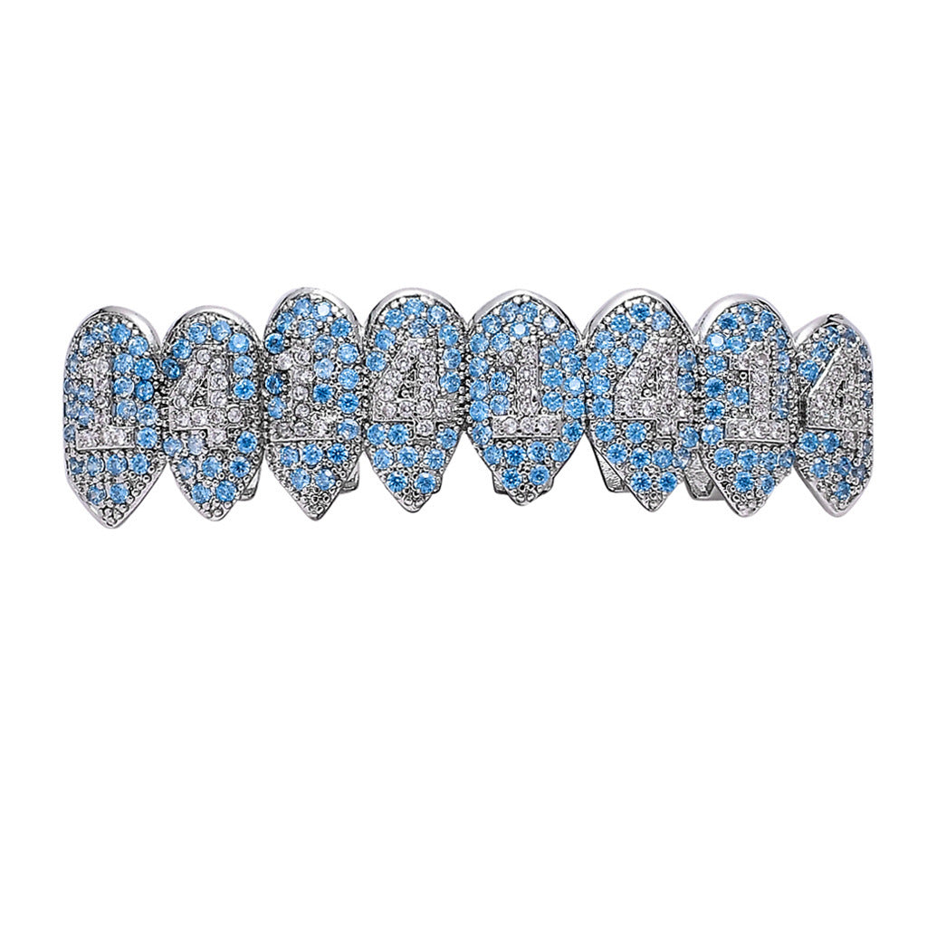 DatNewDrip iced out monster fang grillz in silver with blue and clear cubic zirconia stones full upper set
