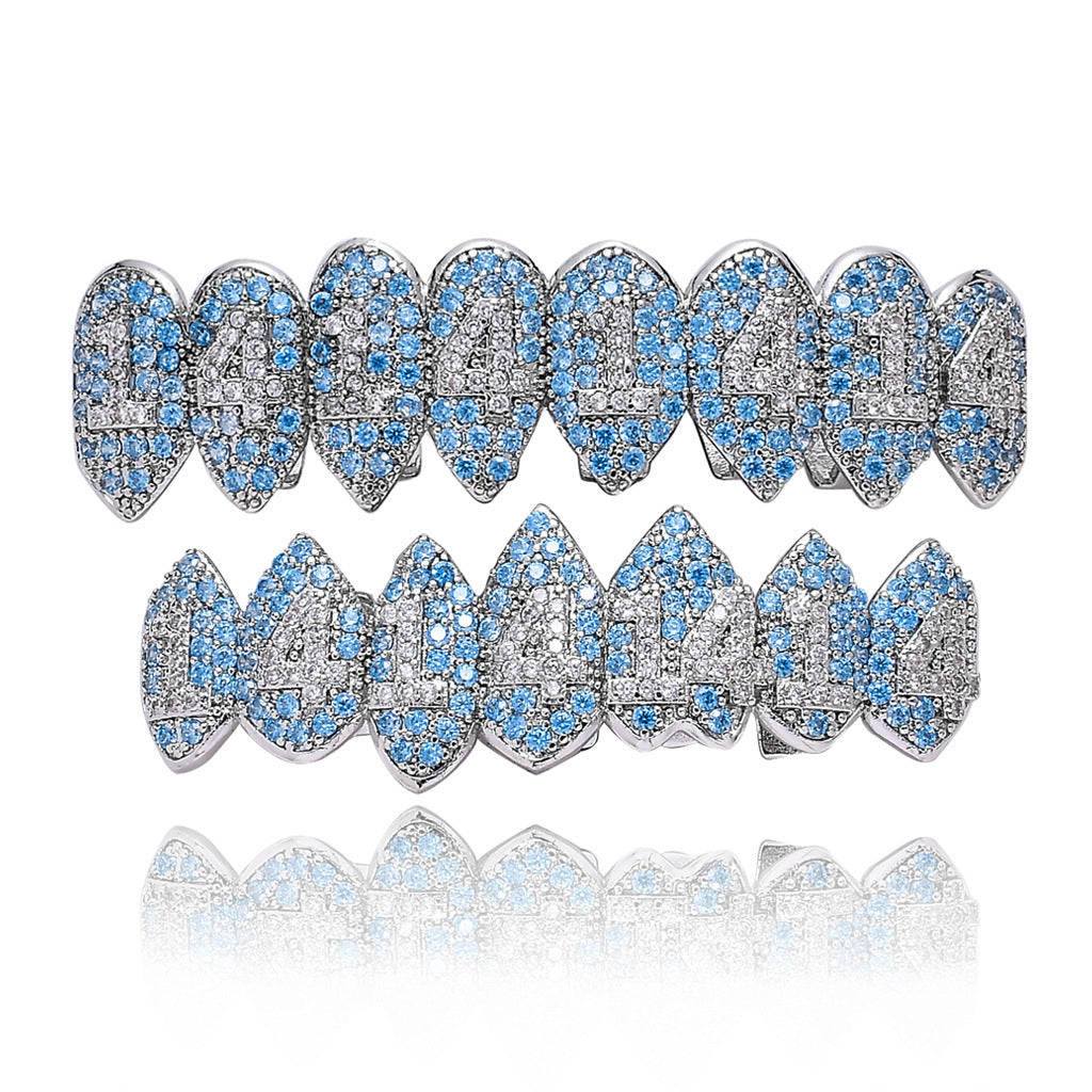 DatNewDrip iced out monster fang grillz silver tooth set with blue and clear crystals top and bottom