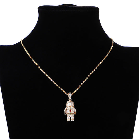 DatNewDrip iced out spaceman pendant on gold chain necklace with crystal encrusted astronaut on black bust