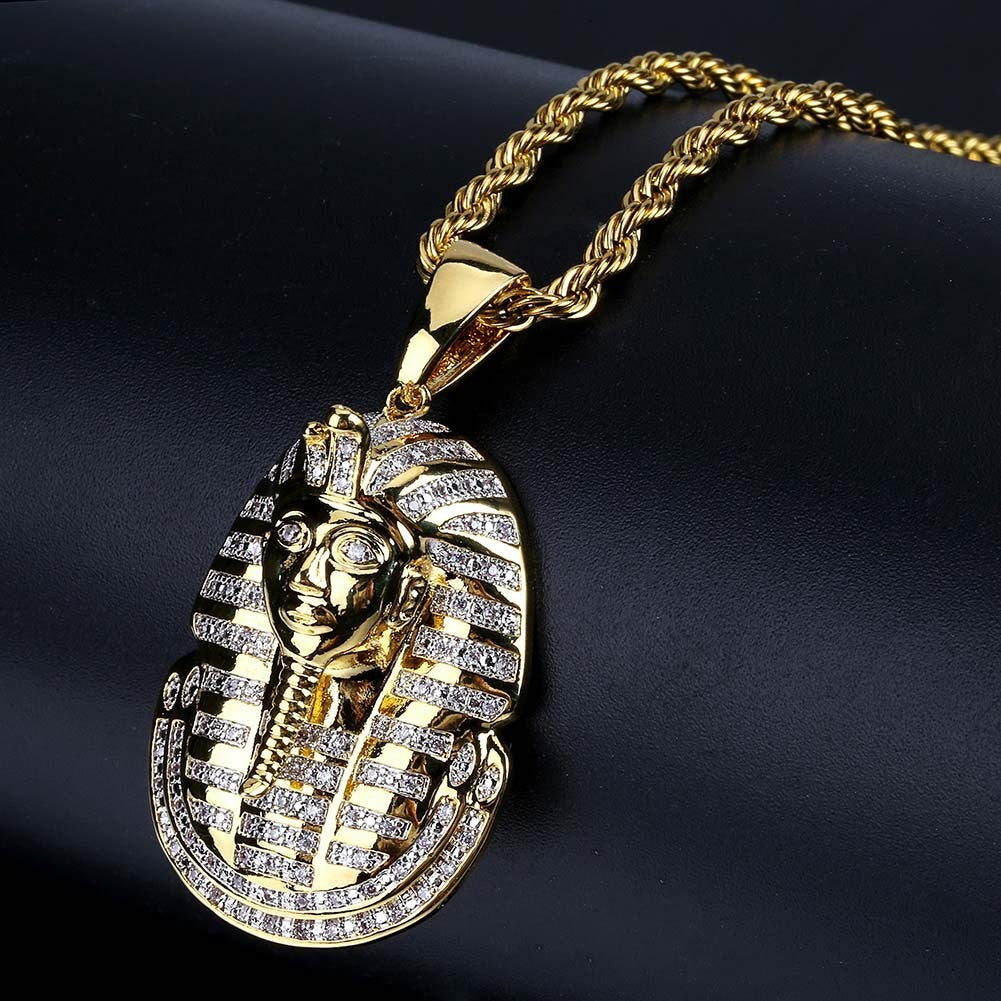 DatNewDrip iced out King Tut pendant gold pharaoh necklace with cubic zirconia accents on rope chain