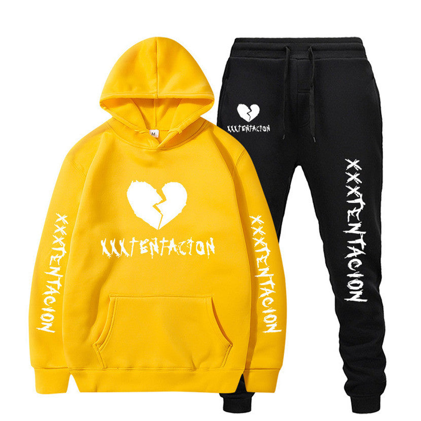 Yellow and black XXXTENTACION hip-hop hoodie and sweatpants set with bold white graphics