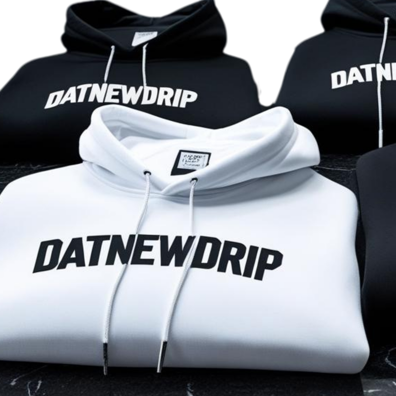 Collection of graphic hoodies featuring bold street art designs with skull, diamond, and dollar motifs