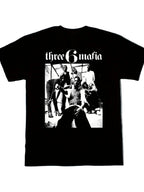 Black t-shirt with 'three 6 mafia' graphic on a white background