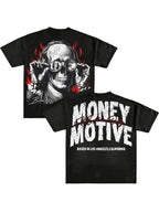 Black t-shirt with a graphic design on the front and text on the back, displayed against a textured wall.