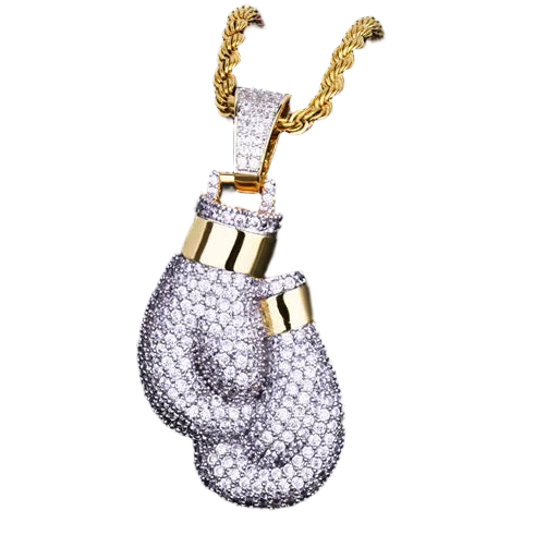 Gold and silver boxing glove pendant on a dark background