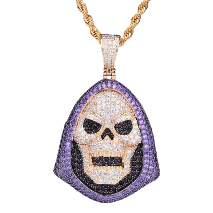 Skull pendant necklace with gold chain on a dark background