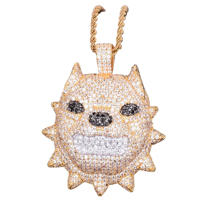Gold pendant with diamond accents on a black background