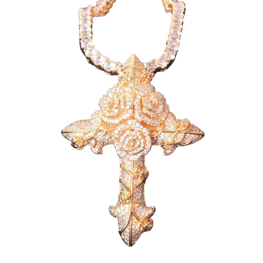 Gold cross pendant necklace on a blue background