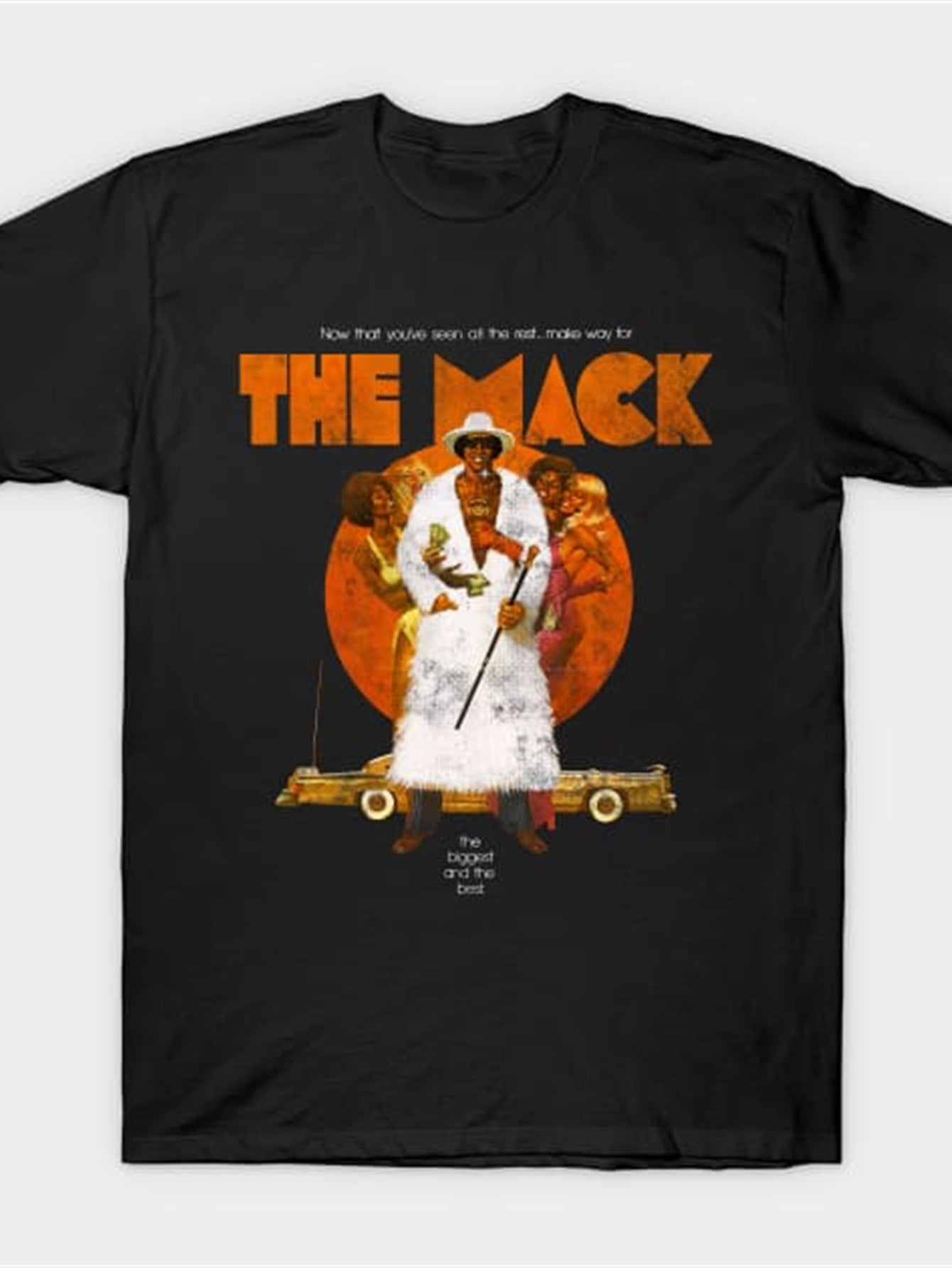 Black t-shirt with 'The Mack' graphic design featuring a person in a white outfit and orange text.