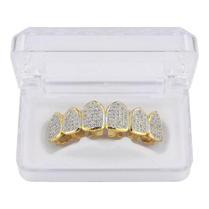 DatNewDrip gold top teeth six piece iced out grillz with pave CZ stones in clear display case on white background
