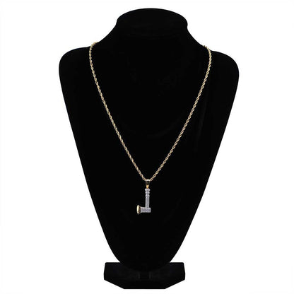 DatNewDrip iced out tomahawk pendant on gold rope chain displayed on black velvet bust for streetwear