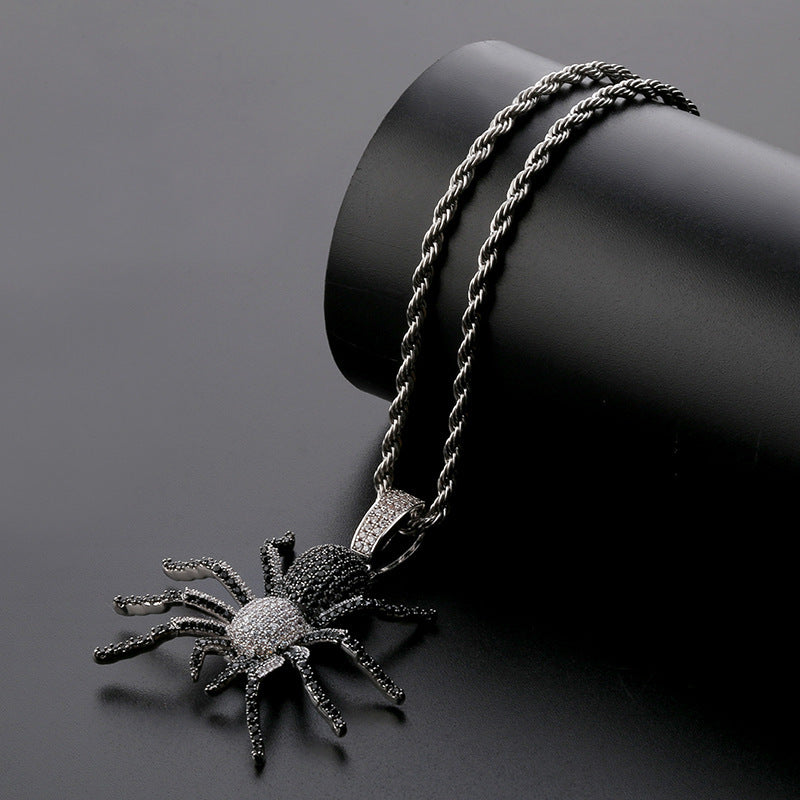 DatNewDrip iced out black spider pendant on twisted black silver rope chain with pave stones
