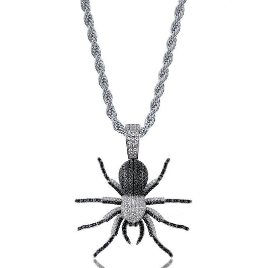 DatNewDrip iced out black spider pendant with black and white crystals on silver rope chain for statement jewelry