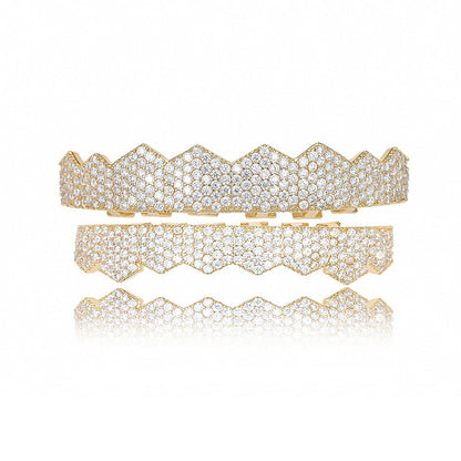 Gold two piece iced out flat tooth grillz set with zigzag flat teeth and pave crystals on display