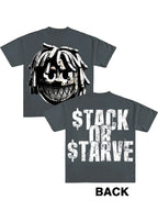 T-shirt with a graphic design on the front and text on the back, displayed against a dark background.