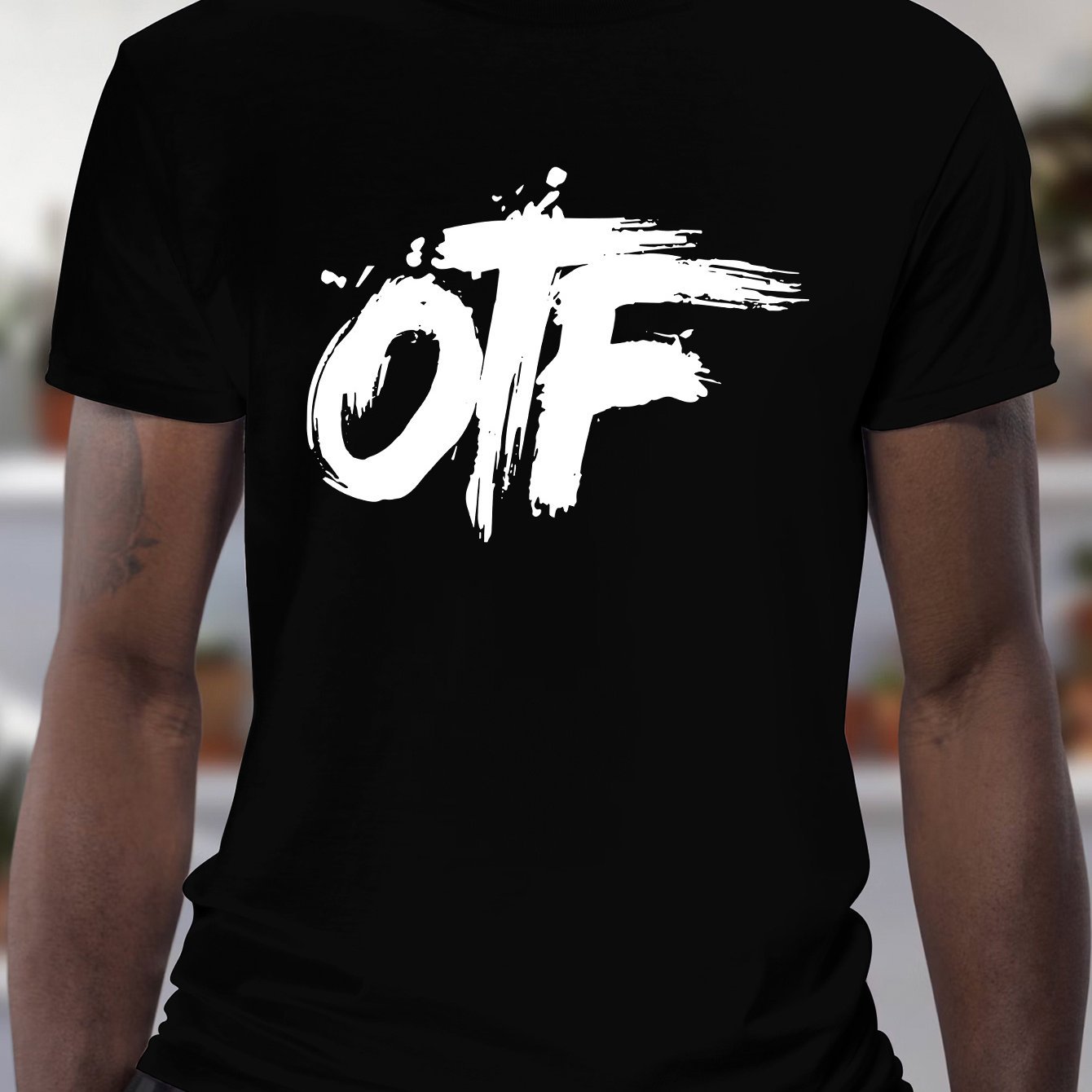 Black graphic streetwear t-shirt by DatNewDrip featuring bold OTF logo design