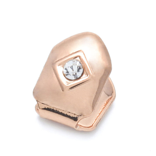 Rose gold single diamond tooth grillz cap with square bezel set stone polished metal