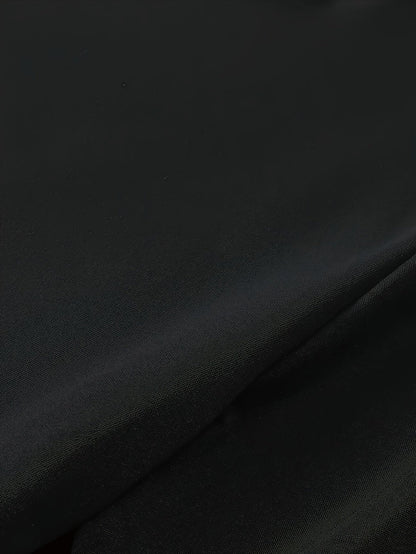 Black graphic streetwear t-shirt featuring a smooth fabric and modern design for casual outfits